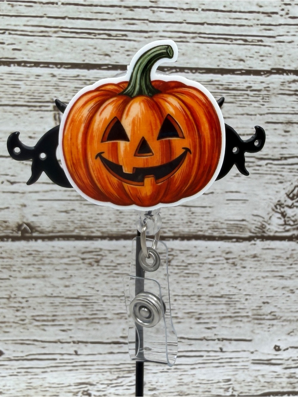 Happy Pumpkin Badge Reel - Orange Pumpkin with Black Accents